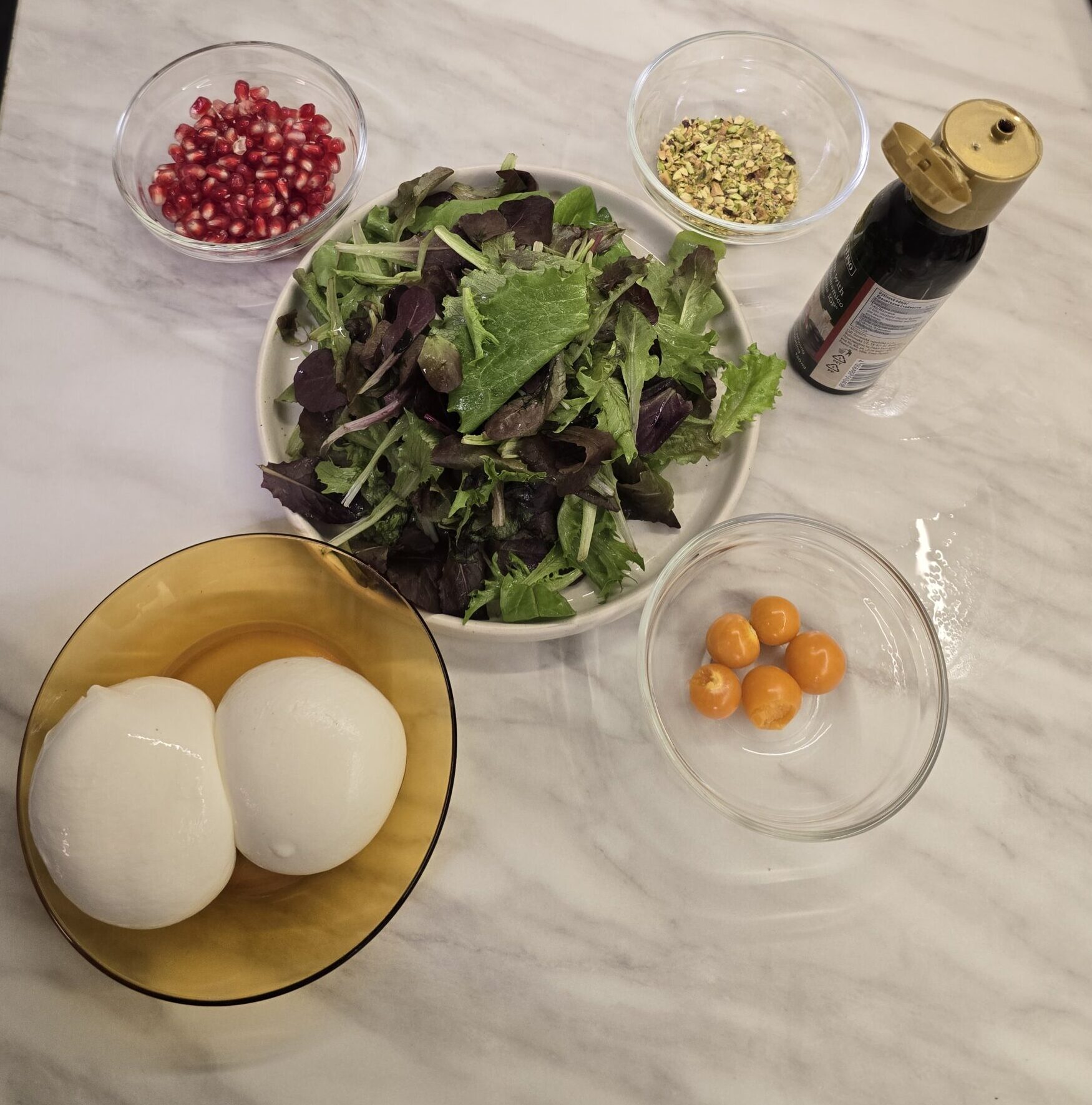 Burrata cheese salad with pomegranate