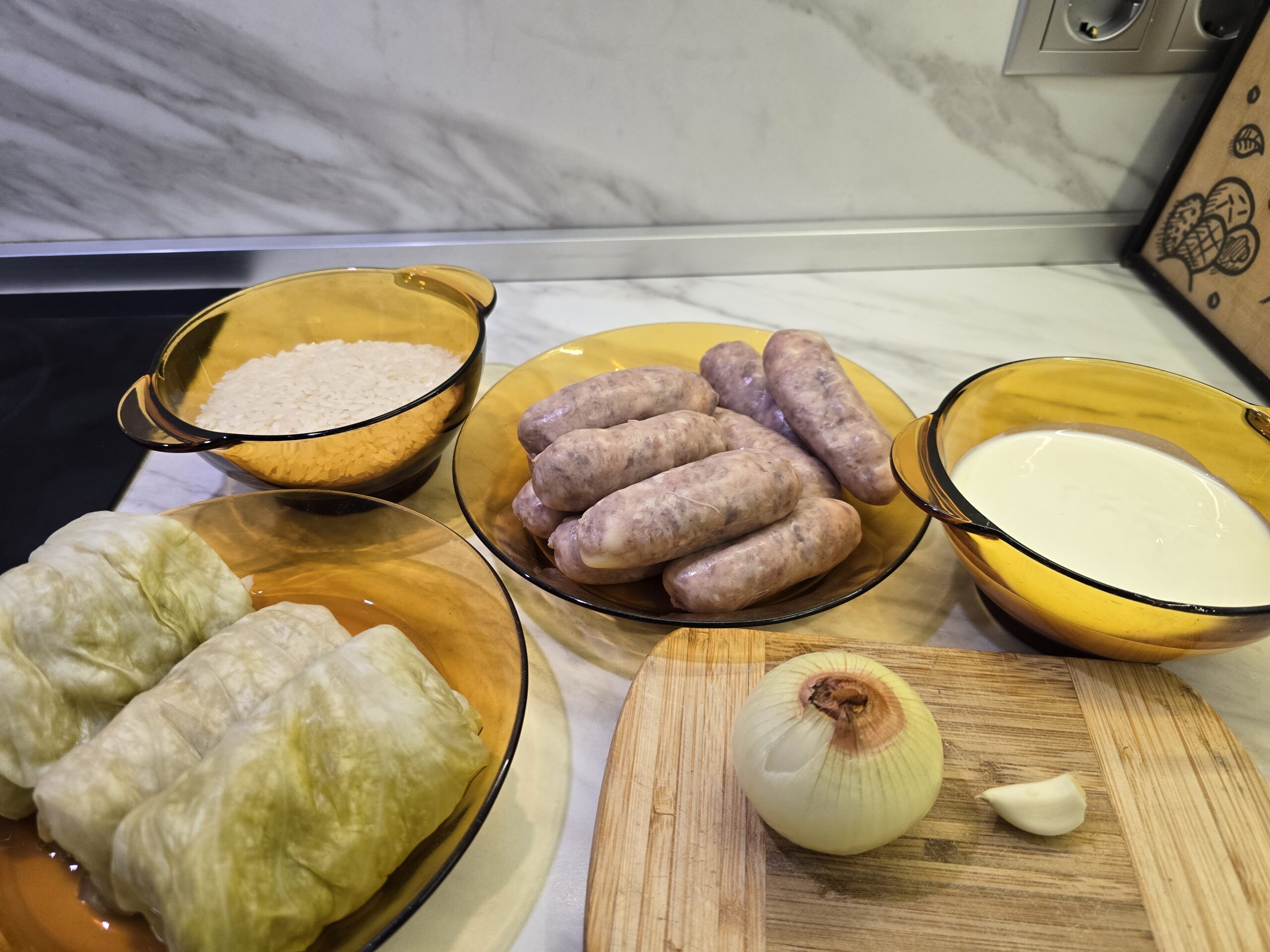 Creamed sour cabbage with rice and sausages