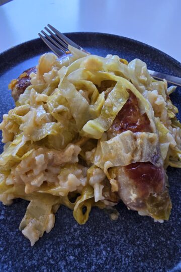 Creamed sour cabbage with rice and sausages