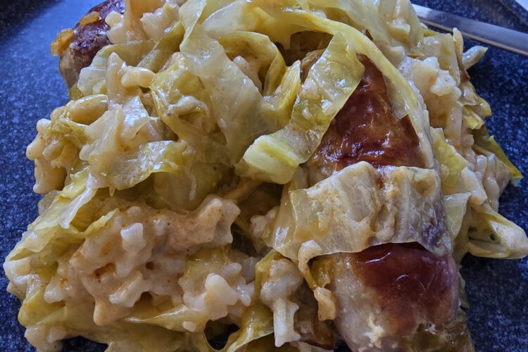 Creamed sour cabbage with rice and sausages