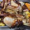 Stuffed turkey baked with bacon