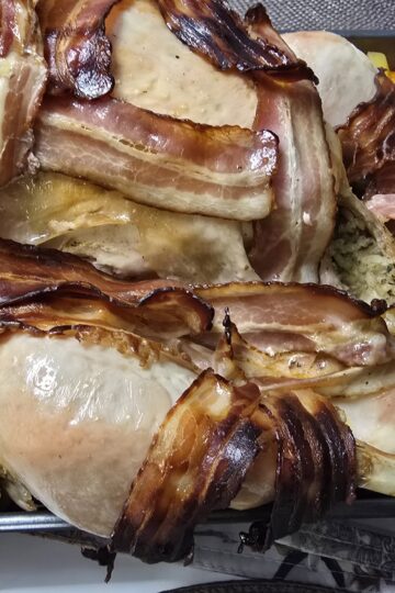 Stuffed turkey baked with bacon