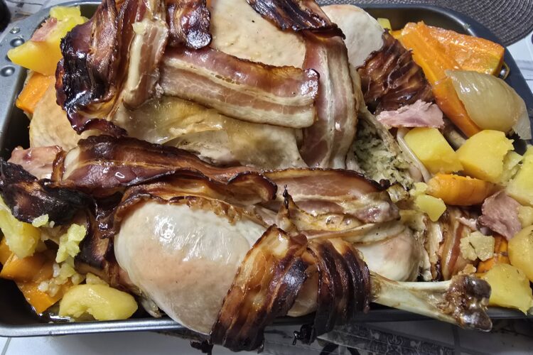 Stuffed turkey baked with bacon